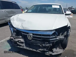 2021 Volkswagen Jetta S z VIN 3VWC57BU4MM037088, wystawiony jako IAAI lot #42087111 z przebiegiem 82 728 mil mil oraz . Historia ofert i sprzedaży dostępna na DreamBid. Obrazek 6.