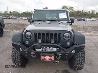 2014 Jeep Wrangler Sport with VIN 1C4AJWAG0EL265409, listed as a IAAI auction lot 41726935 with 78,547 mi miles and . Bid and sale history available at DreamBid. Image 13.