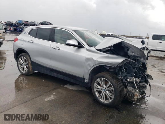 2018 BMW X2 sDrive28i with VIN WBXYJ3C32JEJ75719, listed as a Copart auction lot 60884755 with Not provided miles and Salvage title. Bid and sale history available at DreamBid. Image 4.