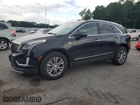 2023 Cadillac XT5 AWD Premium Luxury with VIN 1GYKNDRSXPZ145763, listed as a Copart auction lot 58387365 with 51,368 mi miles and Salvage title. Bid and sale history available at DreamBid. Image 1.