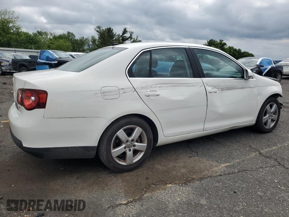 2009 Volkswagen Jetta SE z VIN 3VWRM71K39M057367, wystawiony jako Copart lot #58745235 z przebiegiem 130 647 mil mil oraz Szkoda całkowita • Salvage title. Historia ofert i sprzedaży dostępna na DreamBid. Obrazek 3.