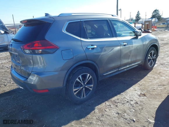 2018 Nissan Rogue S with VIN JN8AT2MV9JW309546, listed as a IAAI auction lot 41600506 with 90,703 mi miles. Bid and sale history available at carsss.com. Image 4.