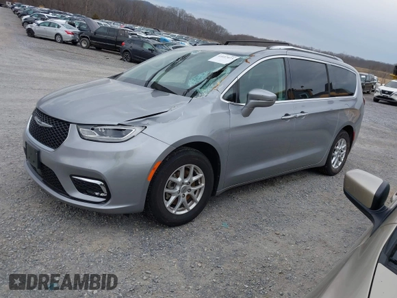2021 Chrysler Pacifica Touring L with VIN 2C4RC1BG3MR542543, listed as a IAAI auction lot 41657073 with 118,833 mi miles and . Bid and sale history available at DreamBid. Image 2.