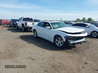 2019 Dodge Charger SXT with VIN 2C3CDXBG7KH661578, listed as a IAAI auction lot 39126917 with 117,594 mi miles. Bid and sale history available at carsss.com. Image 1.