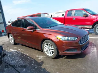 2016 Ford Fusion SE z VIN 3FA6P0H71GR232159, wystawiony jako IAAI lot #42472435 z przebiegiem 138 096 mil mil oraz . Historia ofert i sprzedaży dostępna na DreamBid. Obrazek 1.