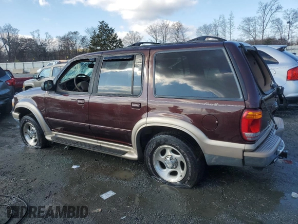 2000 Ford Explorer Eddie Bauer z VIN 1FMZU74E6YUB37521, wystawiony jako Copart lot #85994294 z przebiegiem 126 348 mil mil oraz Szkoda całkowita • Salvage title. Historia ofert i sprzedaży dostępna na DreamBid. Obrazek 2.