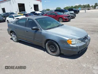 2004 Pontiac Grand Am SE1 with VIN 1G2NF52E84C250525, listed as a IAAI auction lot 42140148 with 156,971 mi miles. Bid and sale history available at carsss.com. Image 1.