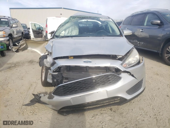 2017 Ford Focus SE with VIN 1FADP3F23HL327032, listed as a Copart auction lot 42398055 with 123,453 mi miles and Salvage Title. Bid and sale history available at carsss.com. Image 5.