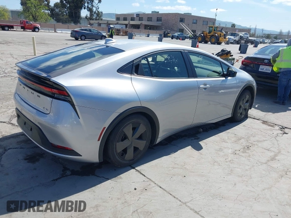 2024 Toyota Prius LE with VIN JTDACAAU3R3024761, listed as a IAAI auction lot 41992059 with 14,119 mi miles and . Bid and sale history available at DreamBid. Image 4.
