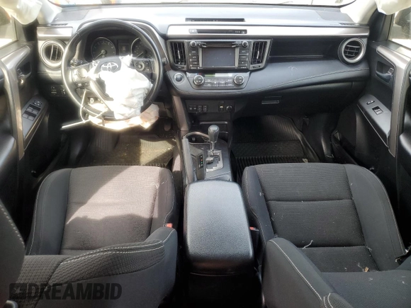 2018 Toyota RAV4 XLE with VIN JTMRFREV5JJ739973, listed as a Copart auction lot 54490225 with 65,807 mi miles and Salvage Title. Bid and sale history available at DreamBid. Image 8.