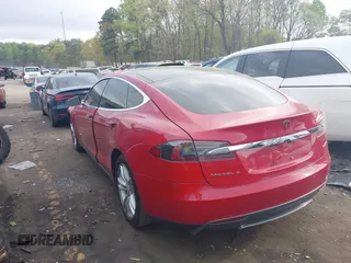 2013 Tesla Model S with VIN 5YJSA1CN1DFP09756, listed as a IAAI auction lot 41921720 with 94,770 mi miles. Bid and sale history available at carsss.com. Image 3.