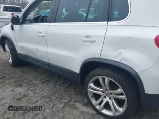2012 Volkswagen Tiguan S with VIN WVGBV7AX0CW543697, listed as a IAAI auction lot 41853077 with 113,002 mi miles and . Bid and sale history available at DreamBid. Image 6.