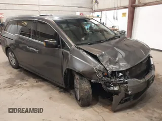 2011 Honda Odyssey Touring Elite with VIN 5FNRL5H96BB030946, listed as a IAAI auction lot 41465741 with 122,678 mi miles and . Bid and sale history available at DreamBid. Image 1.