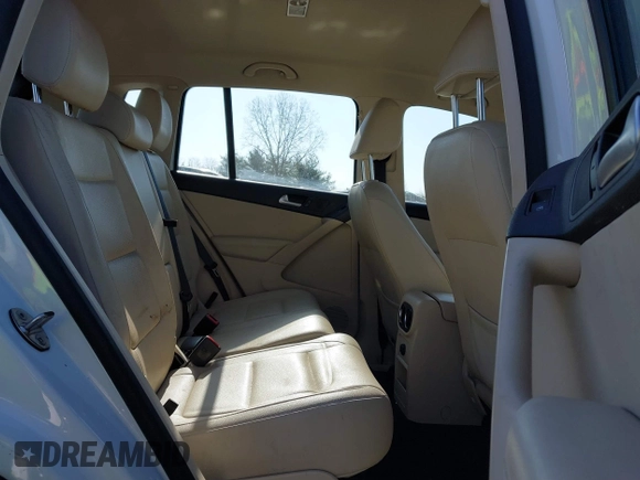 2016 Volkswagen Tiguan SE with VIN WVGBV7AX0GW018760, listed as a IAAI auction lot 41733586 with 60,743 mi miles and . Bid and sale history available at DreamBid. Image 8.