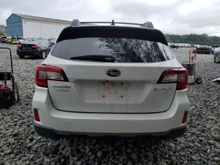 2016 Subaru Outback Premium with VIN 4S4BSAFC4G3337365, listed as a Copart auction lot 63938065 with 111,230 mi miles and Salvage title. Bid and sale history available at DreamBid. Image 6.