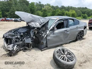 2022 BMW 5 Series M550i xDrive with VIN WBA13BK00NCJ56160, listed as a Copart auction lot 61055635 with 32,190 mi miles and Salvage title. Bid and sale history available at DreamBid. Image 1.