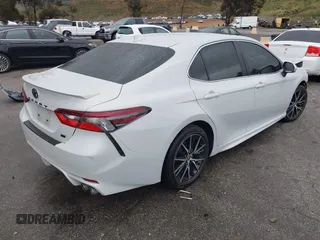 2023 Toyota Camry SE with VIN 4T1G11AK9PU143223, listed as a IAAI auction lot 41794392 with 22,806 mi miles. Bid and sale history available at carsss.com. Image 4.