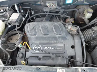 2002 Mazda Tribute LX with VIN 4F2YU08192KM28158, listed as a IAAI auction lot 41832036 with 999,999 mi miles. Bid and sale history available at carsss.com. Image 10.