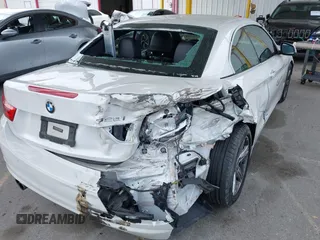 2015 BMW 4 Series 428i with VIN WBA3V7C5XFP772663, listed as a IAAI auction lot 42101012 with 75,901 mi miles and . Bid and sale history available at DreamBid. Image 6.
