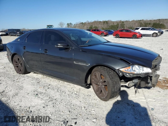 2012 Jaguar XJ with VIN SAJWA1CB1CLV31450, listed as a Copart auction lot 46883875 with 150,268 mi miles and Salvage Title. Bid and sale history available at DreamBid. Image 4.