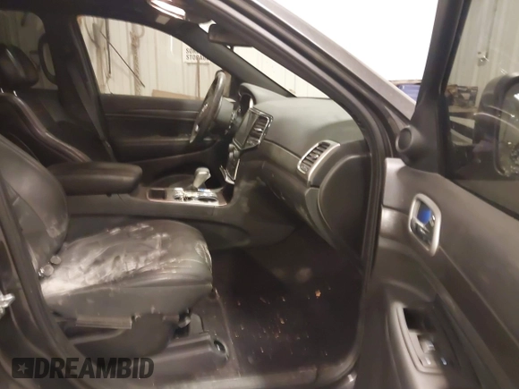 2018 Jeep Grand Cherokee Laredo E with VIN 1C4RJFAG6JC499261, listed as a IAAI auction lot 41033418 with 67,554 mi miles and . Bid and sale history available at DreamBid. Image 5.