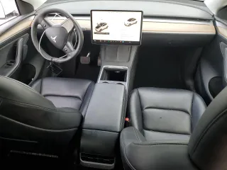 2023 Tesla Model Y Long Range z VIN 7SAYGAEE5PF743079, wystawiony jako Copart lot #45570655 z przebiegiem 46 145 mil mil oraz Szkoda całkowita • Salvage title. Historia ofert i sprzedaży dostępna na DreamBid. Obrazek 8.