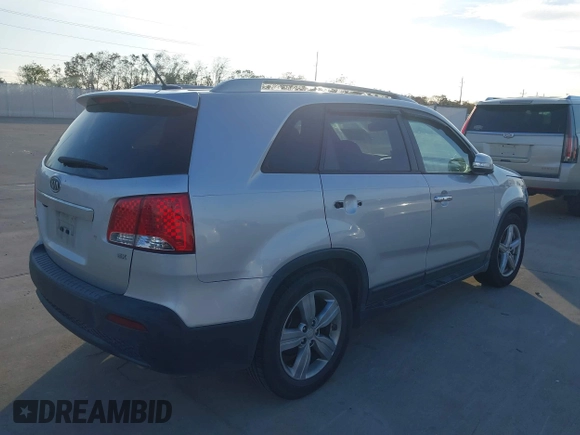 2012 Kia Sorento EX with VIN 5XYKU4A61CG248313, listed as a IAAI auction lot 41045751 with 164,192 mi miles. Bid and sale history available at carsss.com. Image 4.