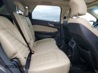 2019 Ford Edge SEL z VIN 2FMPK4J92KBB21770, wystawiony jako Copart lot #56056585 z przebiegiem 64 042 mil mil oraz Szkoda całkowita • Salvage title. Historia ofert i sprzedaży dostępna na DreamBid. Obrazek 11.