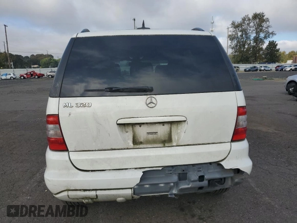 2003 Mercedes-Benz M-Class 3.2L with VIN 4JGAB54E53A395112, listed as a Copart auction lot 74948134 with 203,273 mi miles and Salvage Title. Bid and sale history available at carsss.com. Image 6.