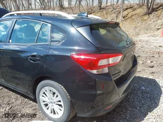 2017 Subaru Impreza Premium with VIN 4S3GTAD65H3716428, listed as a IAAI auction lot 41942299 with 77,181 mi miles. Bid and sale history available at carsss.com. Image 12.