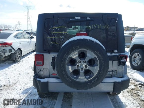 2018 Jeep Wrangler JK Unlimited Sahara with VIN 1C4HJWEG9JL801714, listed as a IAAI auction lot 41591307 with 79,201 mi miles. Bid and sale history available at carsss.com. Image 16.
