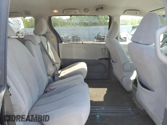 2012 Toyota Sienna LE AAS с VIN 5TDKK3DC0CS183801, выставлен на аукционе Copart как лот 58258035 с пробегом 291 299 миль миль и Чистый • Clean title. История ставок и продаж доступна на DreamBid. Изображение 11.