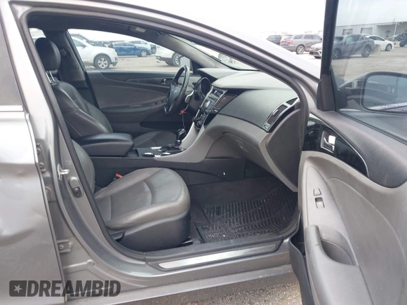 2013 Kia Optima EX with VIN 5XXGN4A75DG148460, listed as a IAAI auction lot 42414837 with 163,999 mi miles and . Bid and sale history available at DreamBid. Image 5.