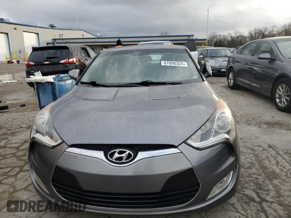 2014 Hyundai Veloster RE:FLEX z VIN KMHTC6AD2EU216453, wystawiony jako Copart lot #87090324 z przebiegiem 147 771 mil mil oraz Czysty tytuł • Clean title. Historia ofert i sprzedaży dostępna na DreamBid. Obrazek 5.
