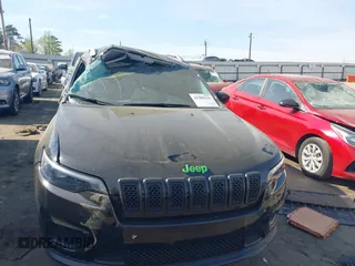 2020 Jeep Cherokee Latitude with VIN 1C4PJLCB2LD552784, listed as a IAAI auction lot 41908936 with 47,337 mi miles and . Bid and sale history available at DreamBid. Image 12.