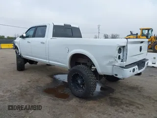 2014 Ram 2500 with VIN 3C6TR5KT3EG309771, listed as a IAAI auction lot 41213964 with 136,617 mi miles and . Bid and sale history available at DreamBid. Image 3.