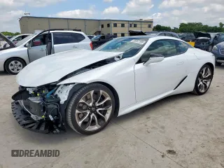 2023 Lexus LC 500h с VIN JTHBP5AY2PA107804, выставлен на аукционе Copart как лот 58967395 с пробегом 4 772 миль миль и Списание • Salvage title. История ставок и продаж доступна на DreamBid. Изображение 1.
