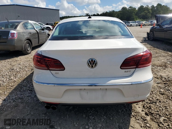 2014 Volkswagen CC Sport with VIN WVWBP7AN8EE538737, listed as a Copart auction lot 68656344 with 131,941 mi miles and Salvage Title. Bid and sale history available at carsss.com. Image 6.