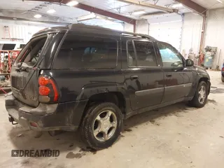 2004 Chevrolet TrailBlazer EXT LT with VIN 1GNET16SX46215438, listed as a IAAI auction lot 41481236 with 240,215 mi miles. Bid and sale history available at carsss.com. Image 4.