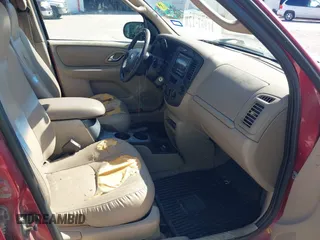 2001 Mazda Tribute LX with VIN 4F2YU09161KM19432, listed as a IAAI auction lot 42052870 with 162,911 mi miles and . Bid and sale history available at carsss.com. Image 5.