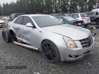 2009 Cadillac CTS RWD w/1SA with VIN 1G6DF577890171787, listed as a IAAI auction lot 41883724 with 146,251 mi miles. Bid and sale history available at carsss.com. Image 1.