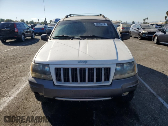 2004 Jeep Grand Cherokee with VIN 1J4GX48JX4C301369, listed as a Copart auction lot 77803094 with 179,404 mi miles and Clean title. Bid and sale history available at DreamBid. Image 5.