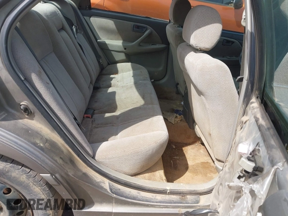 2001 Toyota Camry CE z VIN 4T1BG22K51U053555, wystawiony jako IAAI lot #42042788 z przebiegiem 279 347 mil mil oraz . Historia ofert i sprzedaży dostępna na DreamBid. Obrazek 8.