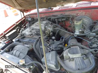 1994 Toyota Pickup SR5 with VIN JT4VN13G6R5136042, listed as a IAAI auction lot 42776057 with 227,301 mi miles and . Bid and sale history available at DreamBid. Image 10.