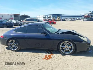 2003 Porsche 911 Carrera with VIN WP0AA29953S620592, listed as a IAAI auction lot 41808347 with 117,175 mi miles. Bid and sale history available at carsss.com. Image 13.