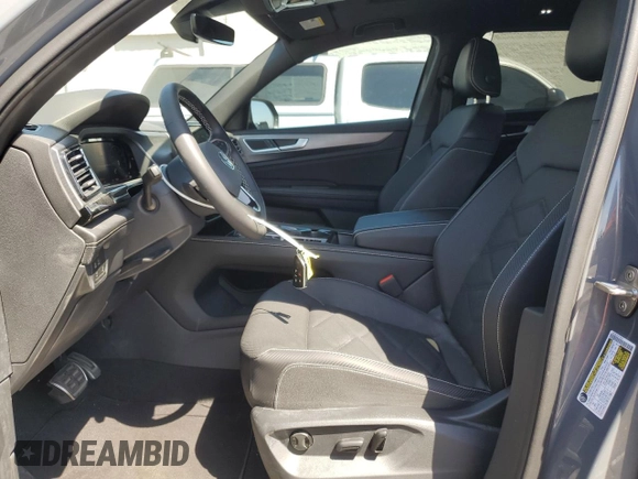 2024 Volkswagen Atlas SE with VIN 1V2JE2CA1RC229108, listed as a Copart auction lot 52820435 with 14,426 mi miles and Salvage title. Bid and sale history available at DreamBid. Image 7.