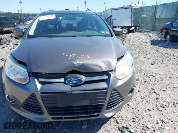 2012 Ford Focus SE with VIN 1FAHP3F27CL276208, listed as a IAAI auction lot 41995770 with 98,004 mi miles. Bid and sale history available at carsss.com. Image 16.