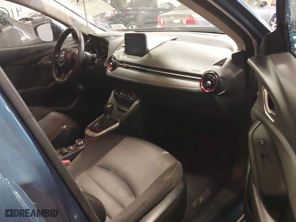 2018 Mazda CX-3 Sport with VIN JM1DKFB70J0321370, listed as a IAAI auction lot 41635558 with 53,995 mi miles. Bid and sale history available at carsss.com. Image 5.