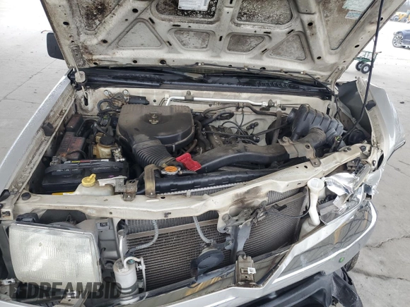 1999 Nissan Frontier XE with VIN 1N6DD26SXXC344449, listed as a Copart auction lot 43748015 with 137,318 mi miles and Salvage title. Bid and sale history available at DreamBid. Image 13.