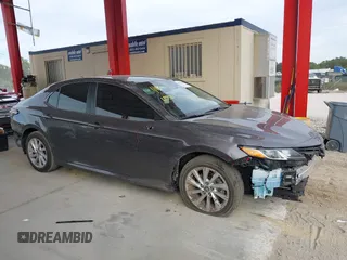 2023 Toyota Camry LE z VIN 4T1C11AK3PU719452, wystawiony jako IAAI lot #38236100 z przebiegiem 34 140 mil mil oraz . Historia ofert i sprzedaży dostępna na DreamBid. Obrazek 14.